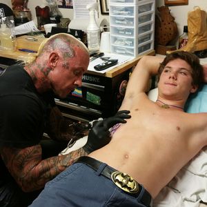 @badboyofmagic working at @mild2wild_tattoo_