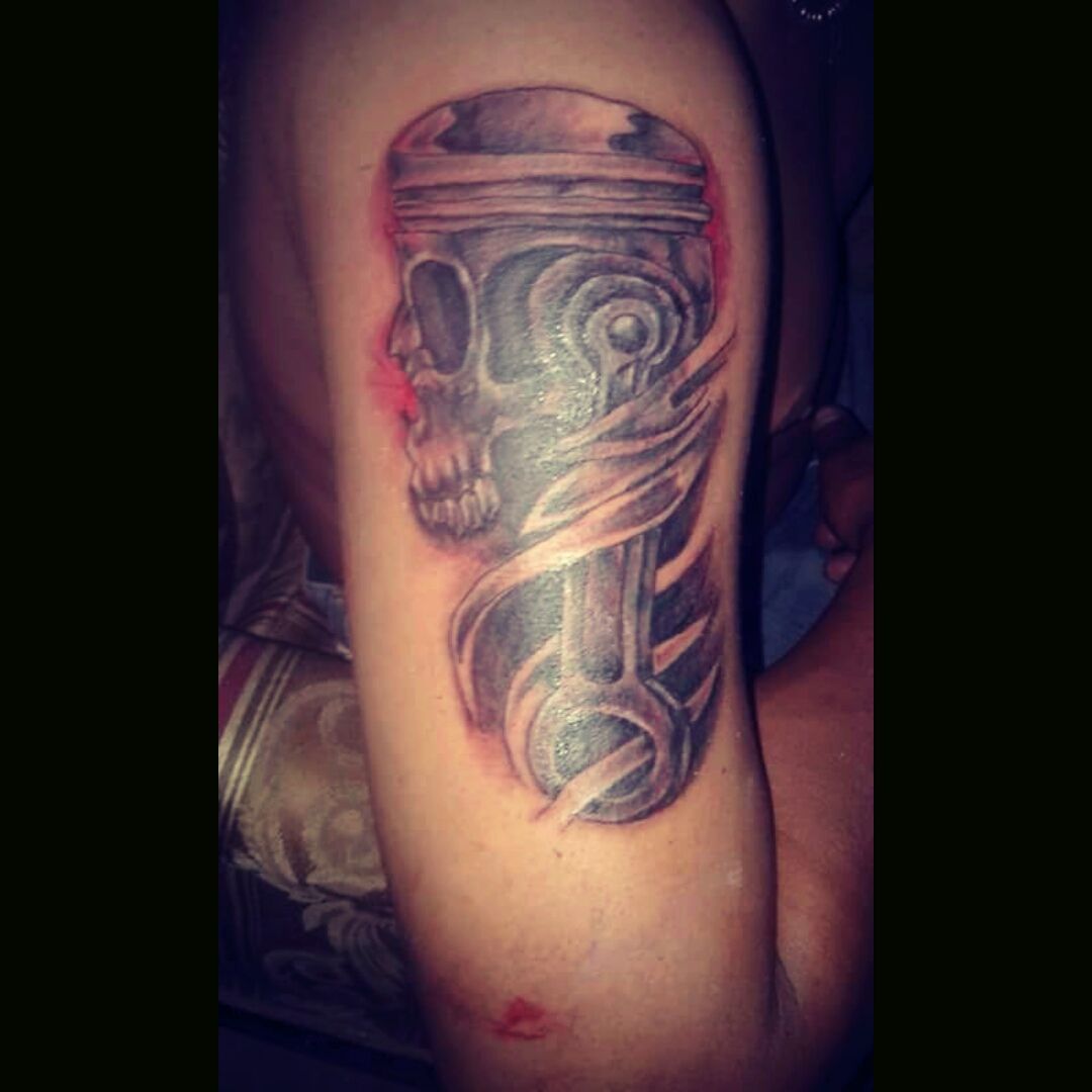 Tattoo uploaded by Octavio Salinas • Dope car piston tattoo • Tattoodo