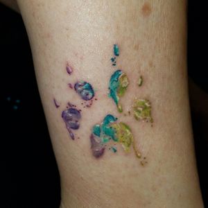 A little watercolor paw print #femaletattooartist #femaletattooist #ink #tattoo #enternalink #furbaby #pawprinttattoo #watercolor #watercolortattoo #dogpaw #color #totallytaboo