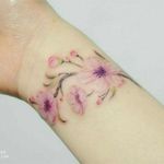🌸 Lovely Blossoms 🌸 #hand #tattoo #watercolor #flowers #blossoms #lovelycolors #pink #sweet #girlytattooart #inlove #romantic #nofilter