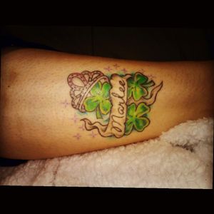 My daughter's name and birthday 3 clovers for March and 13 stars for the day she was born.