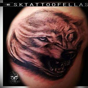 Angry wolf black and gray tattoo...