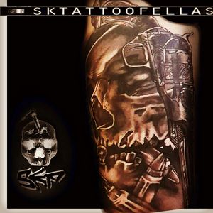 Skull and Revolver black and gray tattoo...