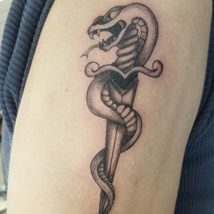 Old school snake and dagger tattoo