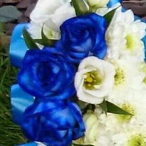 I'm looking to get the blue rose's added my mum  tattoo on my shoulder and am looking for ideas no it