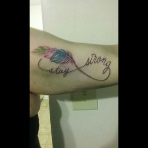A little blurry and not that clean but stay strong with feather on the inner upper arm