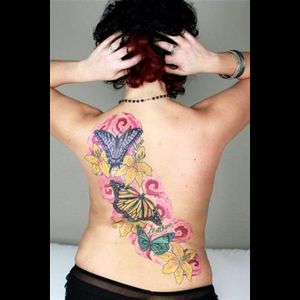 This tattoo is from 2010. It was my gift to myself loosing 65 pounds! My children's names and they are the butterflies around me. I am the butterfly in the middle. It was 3 sessions 11 hours total! In Milwaukee, WI