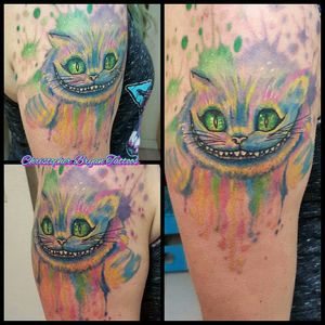 Watercolor Cheshire cat by Christopher Bryan, his and hers tattoo  #watercolor #aliceinwonderland #disneytattoo #DisneyVillain #cheshirecattattoo #couplestattoo #tattooedcouples  #cheshirecat