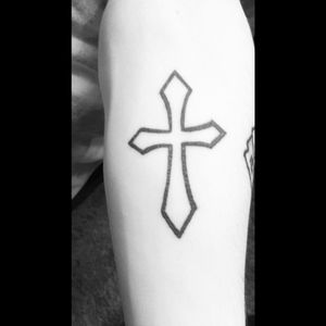 My first tattoo. A simple cross outline