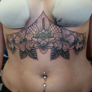 Tattoo by house. Thanks for looking. #underboobtattoo #flowertattoo