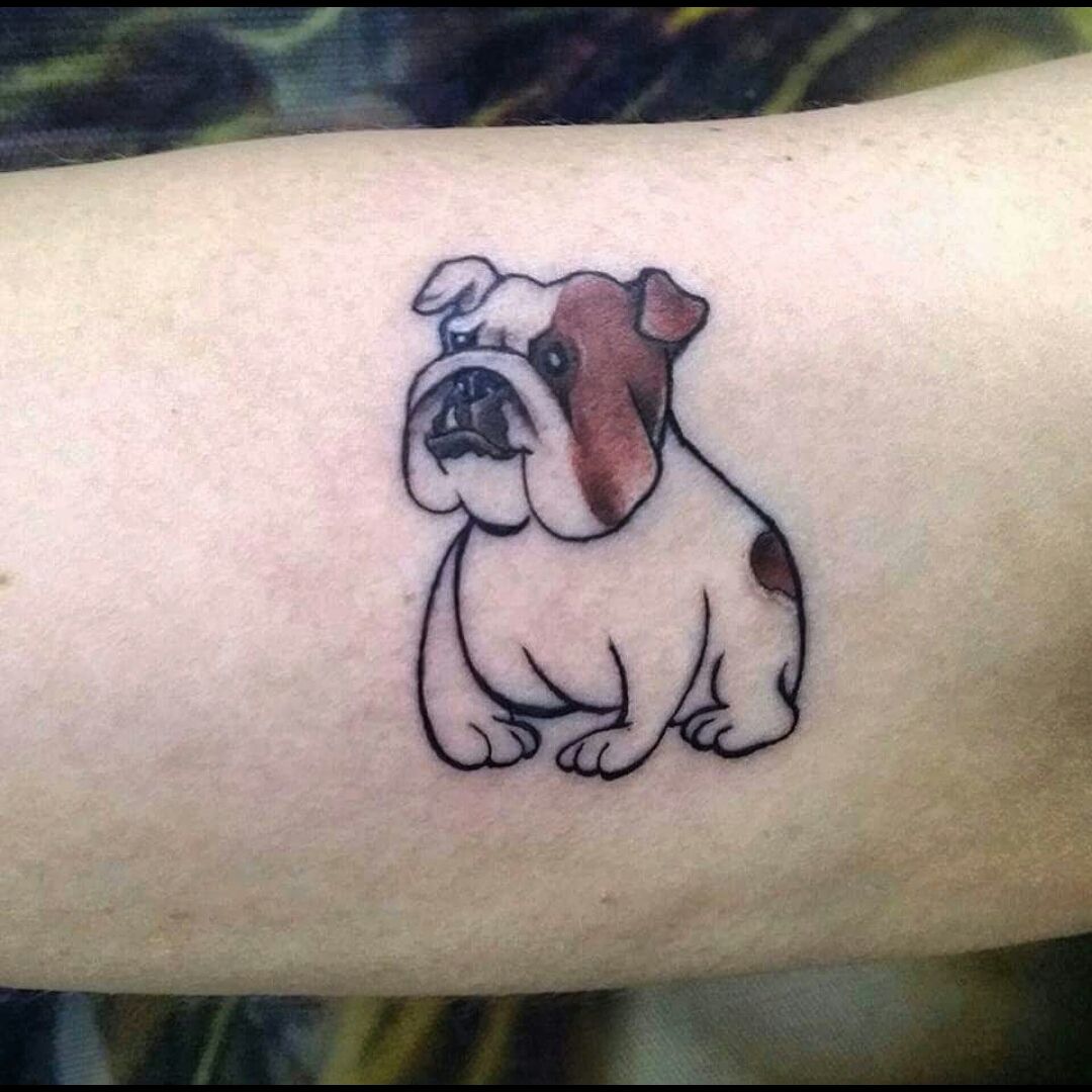 Micro-realistic style bulldog portrait tattoo done on