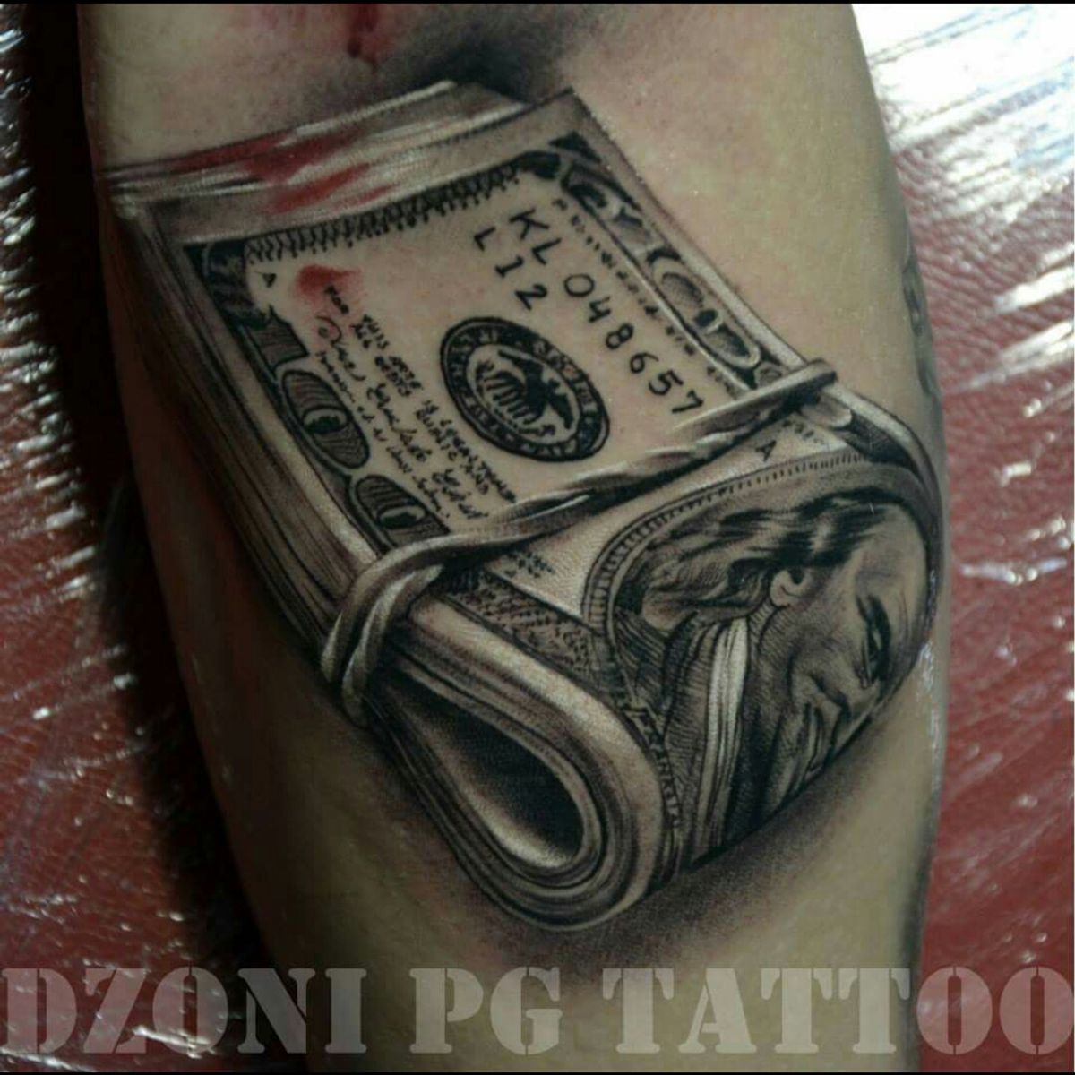 roll of money tattoo