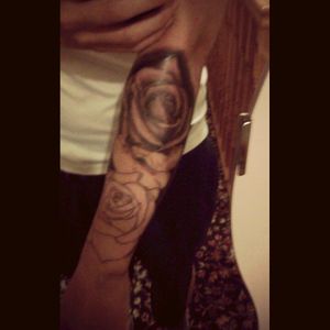 Half sleeve of roses done on my right arm by farran park ink
