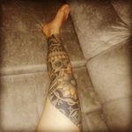 A full blackwork tatto on right leg, with flowers and maori tribals! Obrigado!