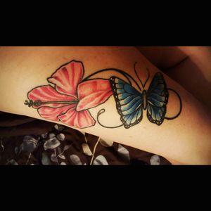 My butterfly represents the transformation I made after my divorce. In the Hibiscus flower represents the unity and peace it brought to me. I would like to continue this and wrap my leg with other meaningful flowers.
