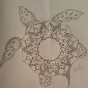 My first try at a mandala. A turtle design that represents my family in Hawaii. This will be my elbow piece