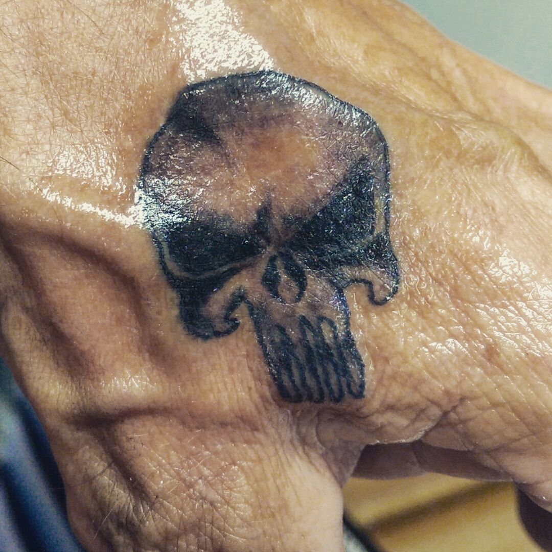 Tattoo uploaded by Amanda • Oiled and unclear but still good. Punisher. •  Tattoodo