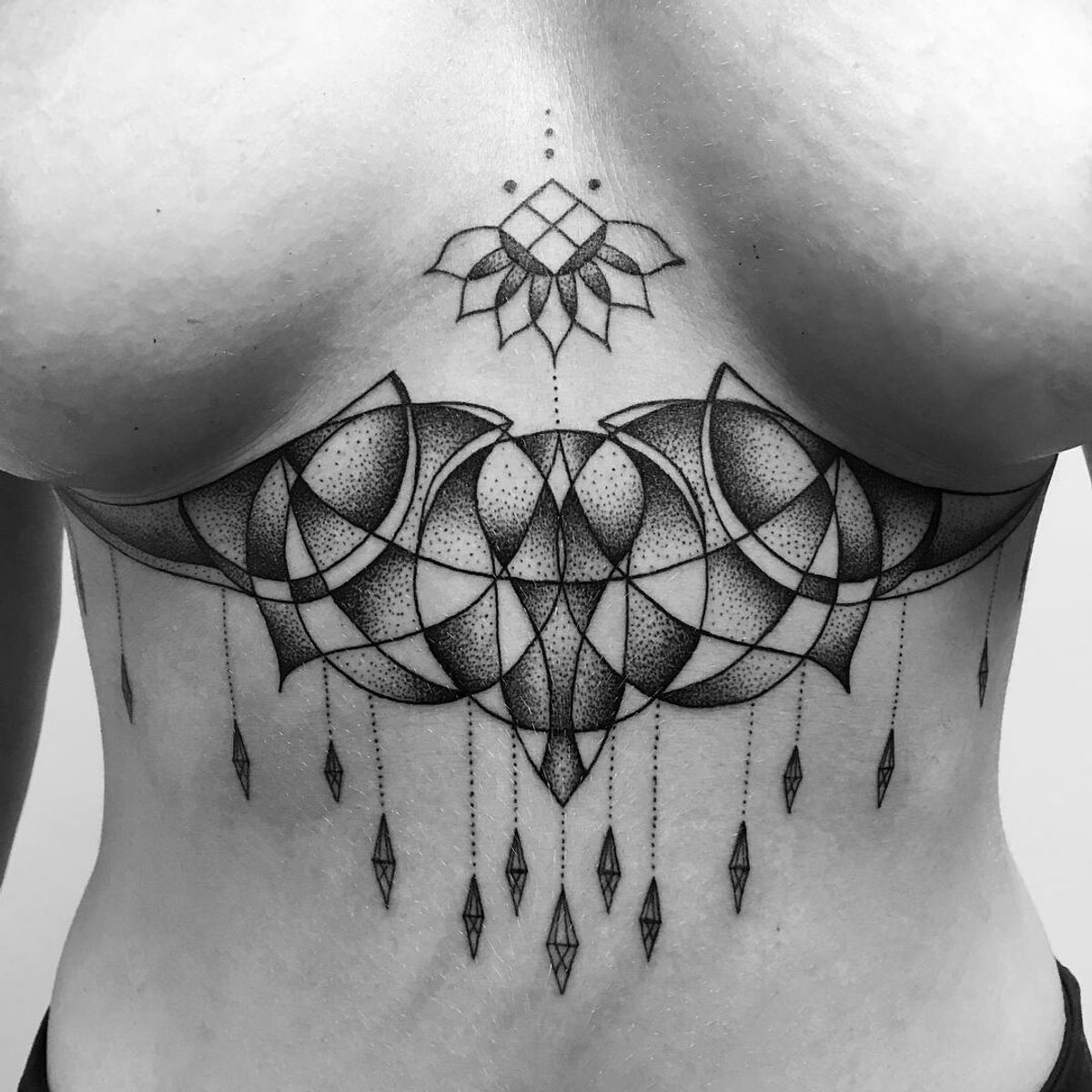 Tattoo uploaded by Claire • By #ikaatattoo #underboob #linework #dotwork  #geometric #blackwork • Tattoodo