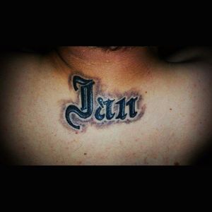 Second Tattoo ,Name of his first son, neck