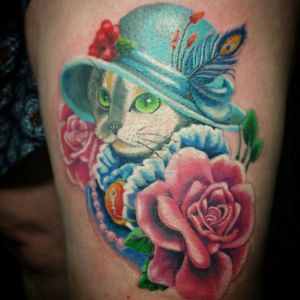 #cat in a sun hat first time ive done this type of style and loved doing it #tattooing #tattooartist #tattoos #designs #ink #inked #tat #neotraditional #roses #art #colour #colors #inkedup #inkoftheday