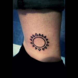 One of my newer editions! Part of a matching set, my best friend has a moon (Will post images of both together) ♡ Was nice to have something simple done c': #linework #blackwork #simple #sunandmoon #sun #bestfriendtattoo #yaaay