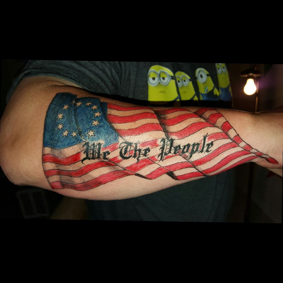 confederate flag waving tattoo