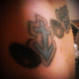 This is located on my left wrist. My son was born in December and this is his zodiac sun sign, Sagittarius