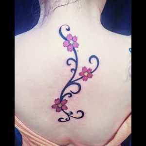 Back floral tattoo flower color