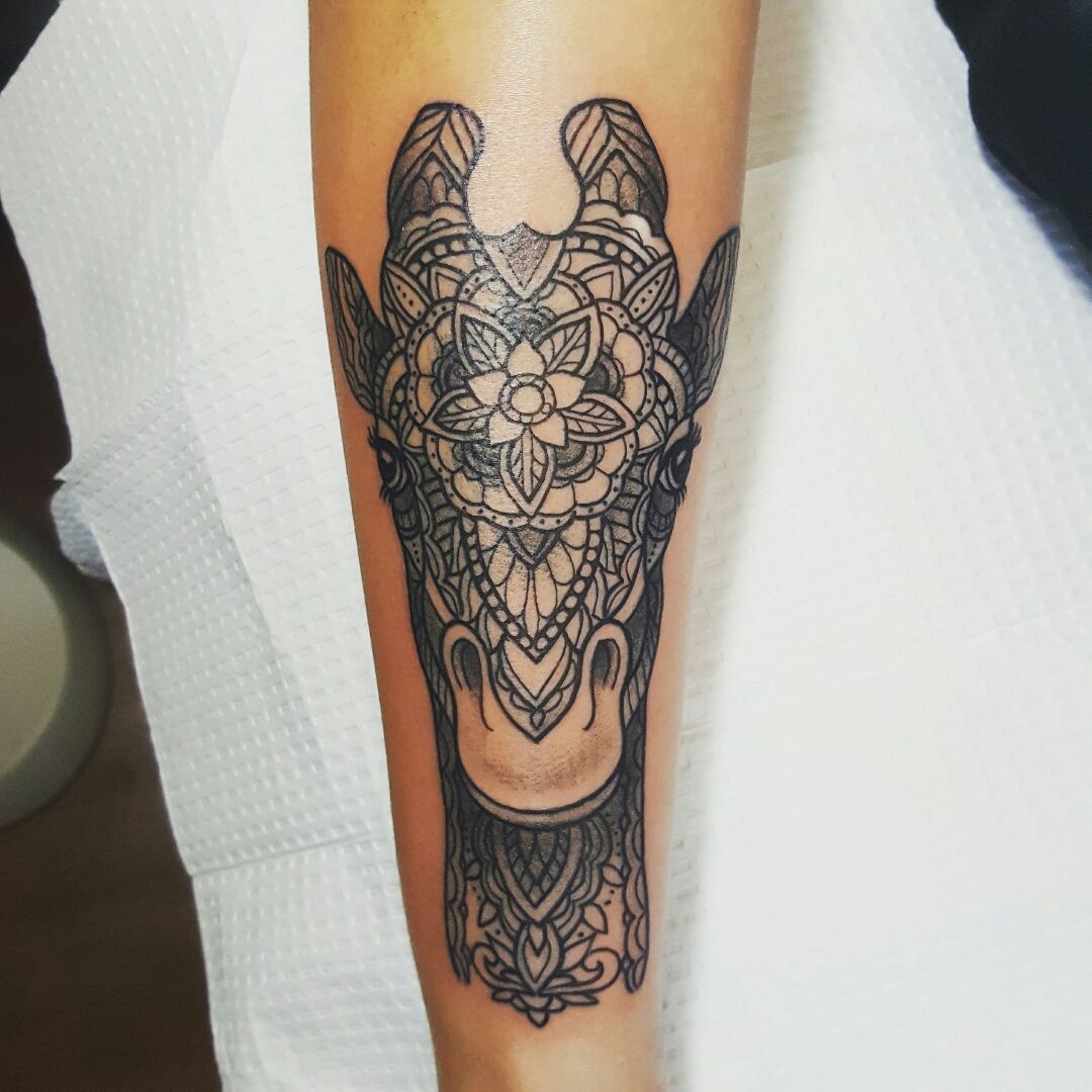 Geometric giraffe tattoo  Tattoogridnet