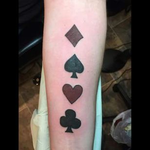 My second tat. In memory of days spent playing cards with my family during a very rough time in my life. 2 of the family members have passed on.
