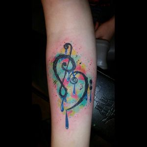 Music tattoo#colortattoo #colortattoos #nashvilleinktattoo #nashvilletn #tattoo #armtattoo #forearmtattoo #therosetattoo #tattooartist #tattooart #tattooshop #thebesttattooartists #music #musictattoo #musicnotes #tattoedgirl