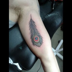 Most recent tattoo. To complement my wife's peacock tattoo on her back. #peacock #feather