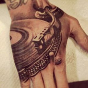 Not mine but like this idea to finish off my music sleeve #music #hand #recordplayer #tattoo