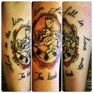 My Twilight Cullen crest tattoo with a quote from the book and film; " and so the lion fell in love with the lamb"