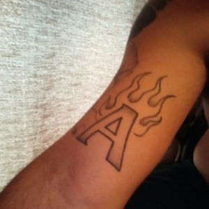alpha symbol tattoo