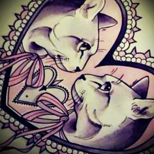 #megandreamtattoo I like the lacey/cameo design around the outside, and the placement of the kitty's. I would love something like this, featuring my 2 cats. Might need more colour though...
