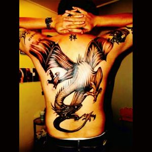 Who wouldn't ? ,A Dragon tattoo on The upper back part #tattoodragon