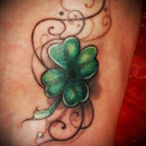 Across the back of my neck.  My hubby and I met on St. Patrick's day.
