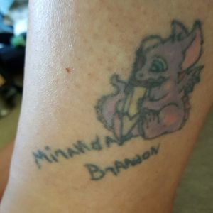 Twenty years ago I had this tattooed over my ankle.  My daughter was just a year old.  I had the dragon print my kids names.