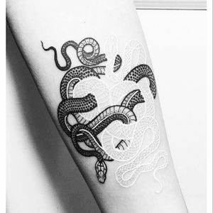 Want so much. Snakes are one of my favourite animals and the contrast of the black & white ink shows a kind of duality between the good and the bad that has me totally in love with it.#megandreamtattoo
