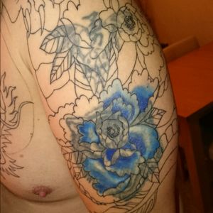 Start of cover up on left upper arm.Done by sarah at Athena Ink.