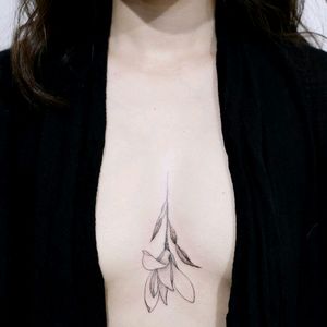 By #tattoist_doy #Magnolia #underboob #linework #floral #minimalist