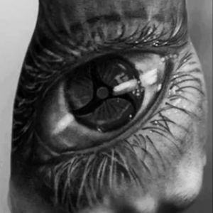 I came across this tatt on Tattoodo n thought of getting one on each foot with the eye color bluish green or bluish gray