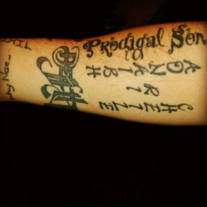 A few on my forearm, ambigram, prodigal son and my clan motto