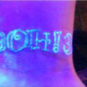 On my wrist got the band 3oh!3 in UV ink.