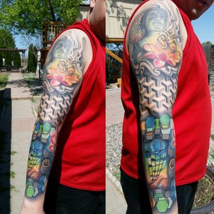 My full sleeve done by Luis Garibaldo at Van's High Caliber tattoo in Kennewick, Wa #sleevetattoo #color #colortattoo #buddhatattoo #ohmtattoo #floweroflifetattoo #musictattoo