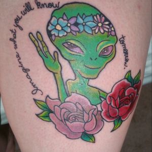 My first tattoo done by Juan Guilfu at Atomic Tattoo in Austin Texas. It has my favorite quote from Men In Black "imagine what you will know tomorrow." #firsttattoo #meninblack #alien #roses