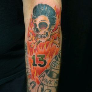 Pompadour skull elvis died n my ma went into labor. The green 13 is well if ya know ya know! My arm is sleeved out with those flames now from wrist to elbow Sam Wolf Signature Tattoo