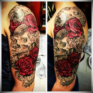 I want roses like this surrounding my arm band of my name ...on the roses I want my kids names
