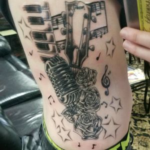 Musical Tattoo Artist: John MooreHappy Dragon Abilene Texas